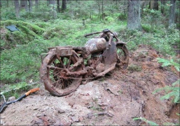 WW2 Motorcycle Swallowed by the Forest (8 photos)