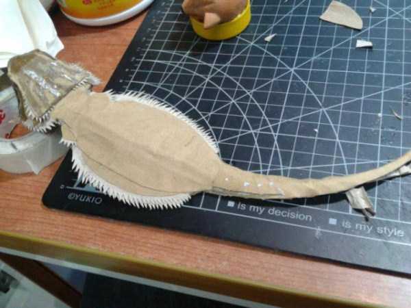 lifelike bearded dragon made out of cardboard 8