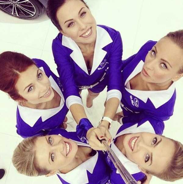 Attractive Hostesses of Moscow Car Show Taking Selfies (26 photos)