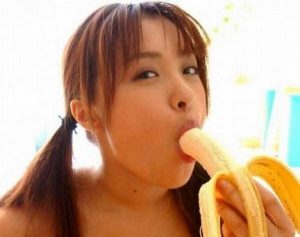 girls eating bananas 22 300x237