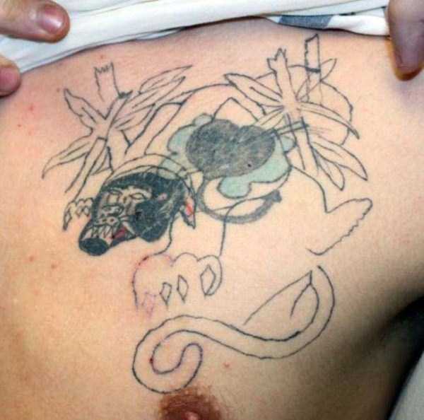 Hilariously Bad Low Budget Tattoos (25 photos)